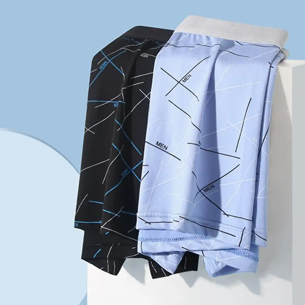 

Мужское нижнее белье с хорошей воздухопроницаемостью. Трусы-боксеры плотного кроя. Мужские эластичные трусы-боксеры со средней талией и принтом линий на каждый день.