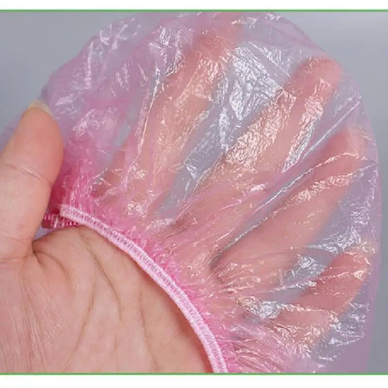 100pcs/set Disposable Shower Caps Plastic Waterproof Headgear Pink Spa Salon Hotel Hair Dye Women Elastic hair Cap Bathroom