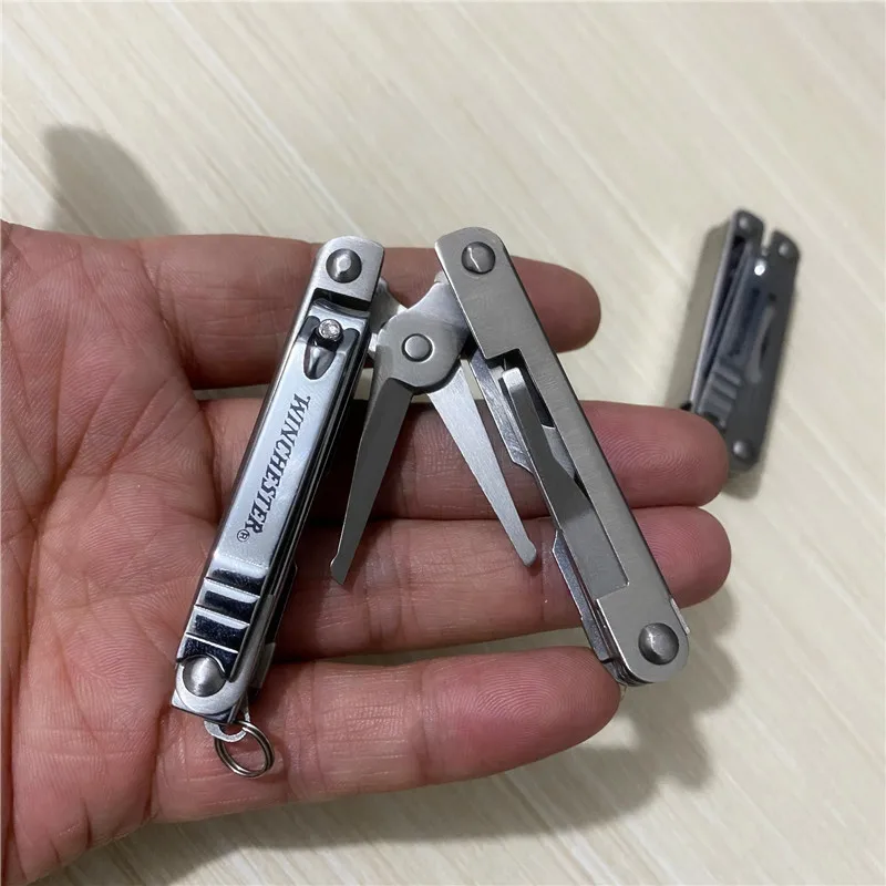 Foreign trade tail BG multifunctional folding scissors wimchester combination tool nail clippers portable bottle opener knife