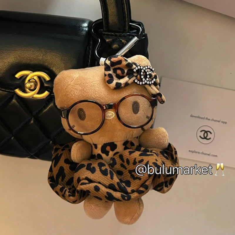 سانريو مرحبا كيتي الجلد الداكن أفخم المفاتيح Kawaii بلوشي محشوة اللعب دمية قلادة لحقيبة الظهر محفظة الفتيات حقيبة الملحقات