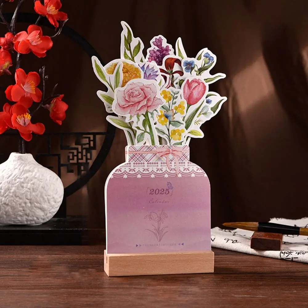 2025ดอกไม้บานปฏิทินตั้งโต๊ะปฏิทินปฏิทินจิ๋วโต๊ะพับได้เหมือนแจกันสมุดแพลนเนอร์รายเดือนสำหรับบ้านโรงเรียนสำนักงาน