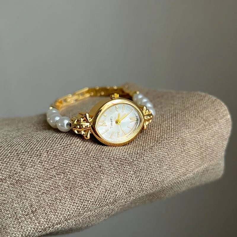 

Высокое качество ретро золотой маленький римский циферблат женские часы роскошный жемчужный браслет для девочек кварцевые часы элегантные женские наручные часы Reloj
