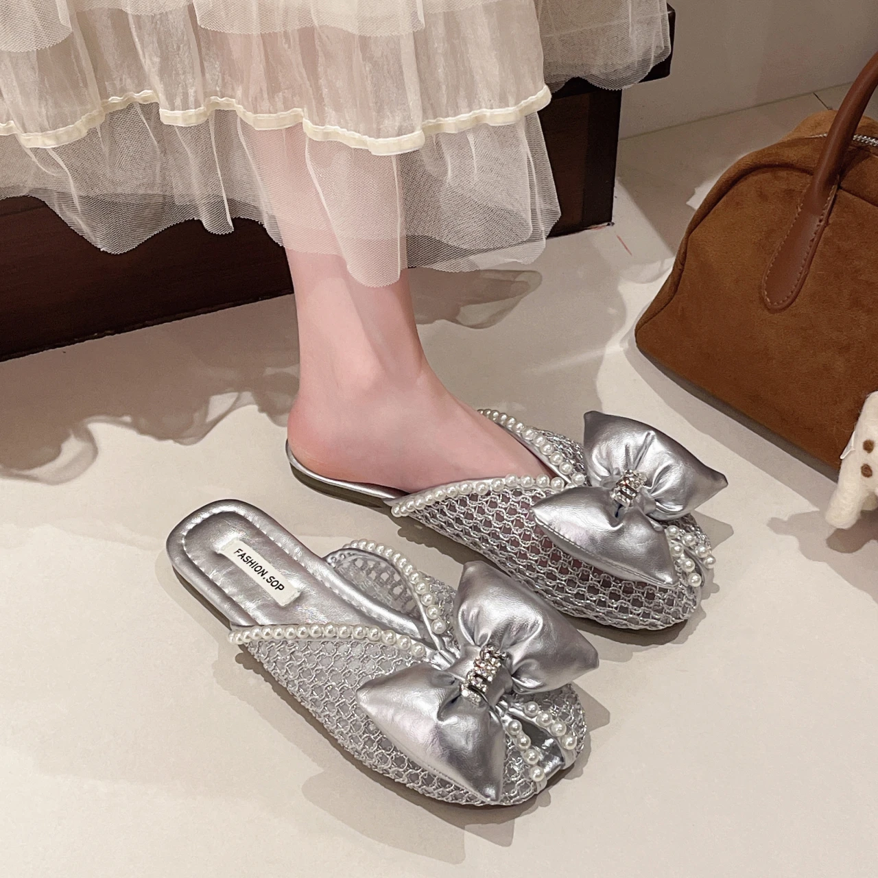 المرأة الجنية الرياح بلون باوتو النعال الصيف موضة جديدة الكورية القوس الديكور جوفاء تنفس نعال مسطحة. #2