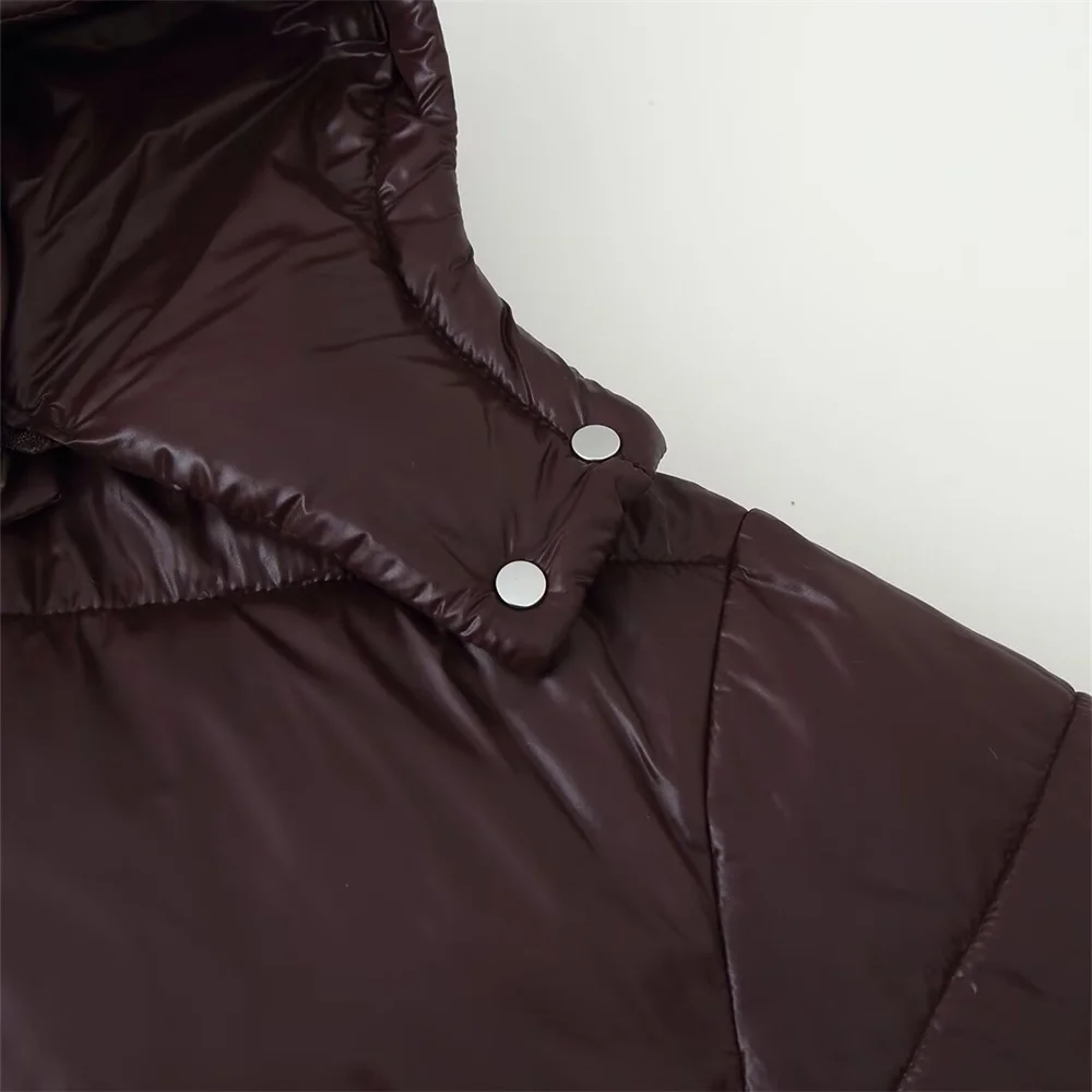 Zimowa nowa damska kurtka bawełniana o luźnym kroju, zapinana na zamek, z długim rękawem, stójką, kapturem, błyszcząca, typu kurtka chlebowa.