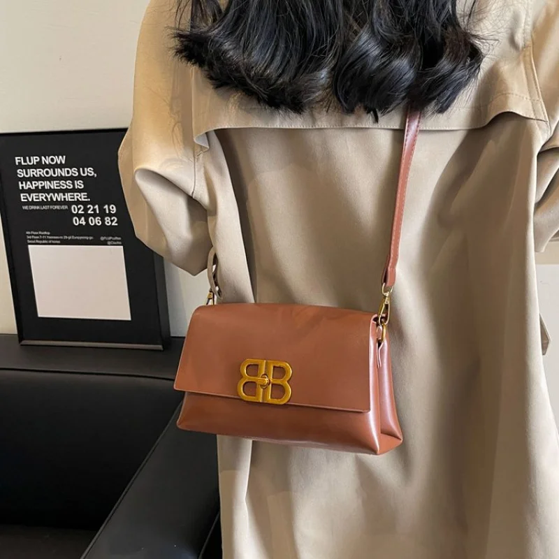 

Fashionable Messenger Bag For Women Made Of Durable Leather, Crossbody Option By Luxury Brand With Multiple Compartments