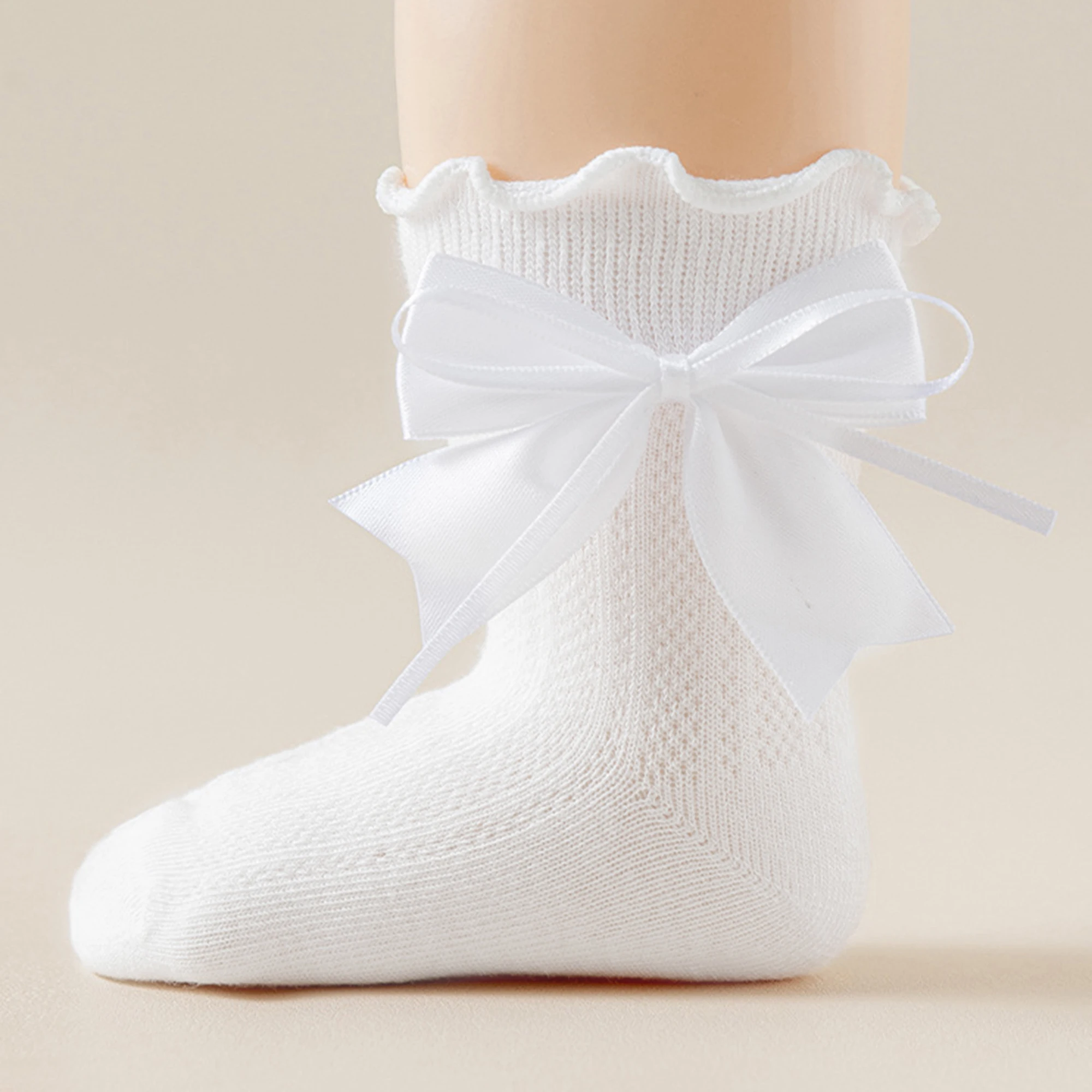 Meias adoráveis até o joelho para meninas com detalhes de laço em cores sólidas – Meias de malha de princesa doce para novidades