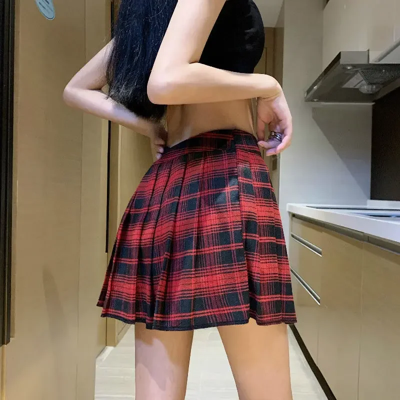 Falda plisada de cintura alta para mujer, falda sexy negra gótica Harajuku, falda punk para niña con pantalones cortos, nueva falda a cuadros de