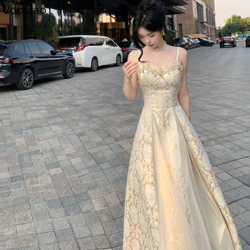 フレンチエレガントな海辺のホリデーパーティードレス女性甘いスパンコールパールチェーン妖精ロングドレスレディースビーチ自由奔放に生きる誕生日ドレス