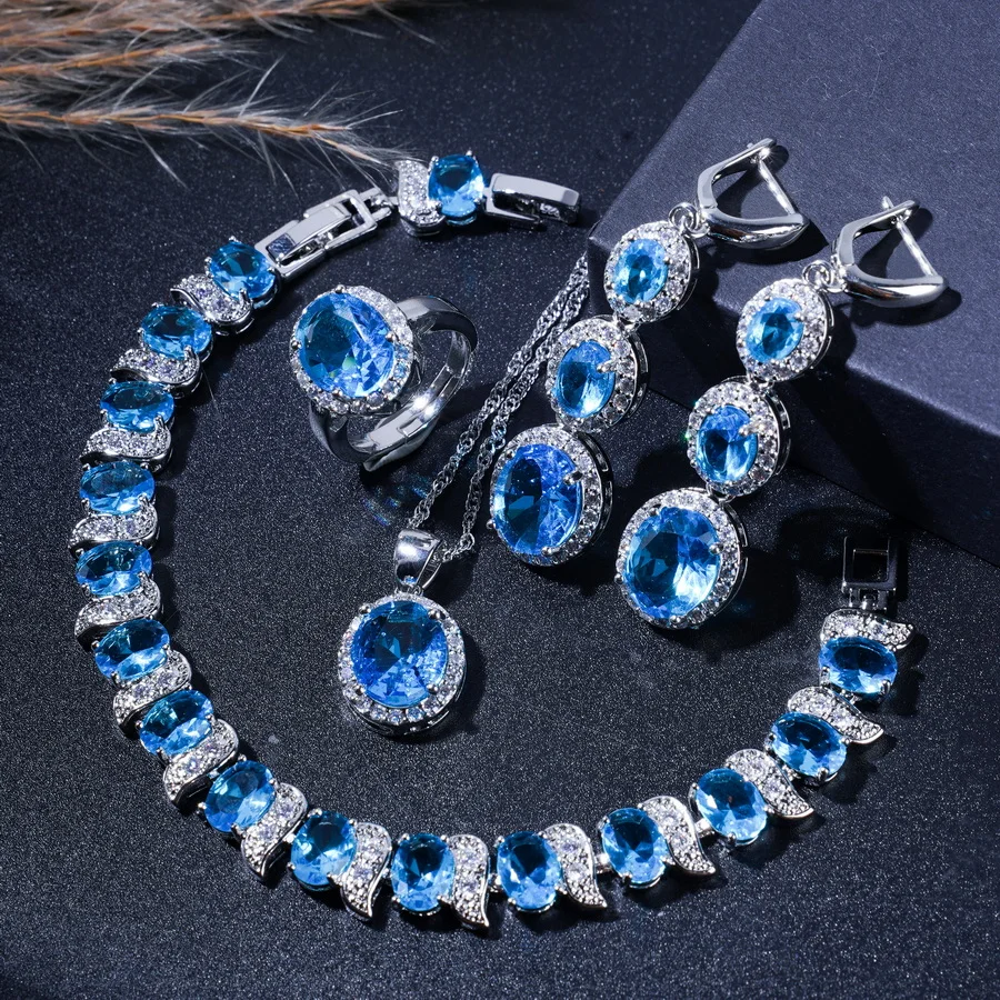 

4PCS- Elaegant Sky Blue Zircon Fashion Jewelry Set - Includes Bracelet, Earrings, Necklace, And Rings For Everyday Wear