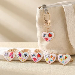 Fashion Enamel Eyes Heart Keychain for Women Artistic style Personality Creative Key Buckle Bag Earphone Case Decor Jewelry
