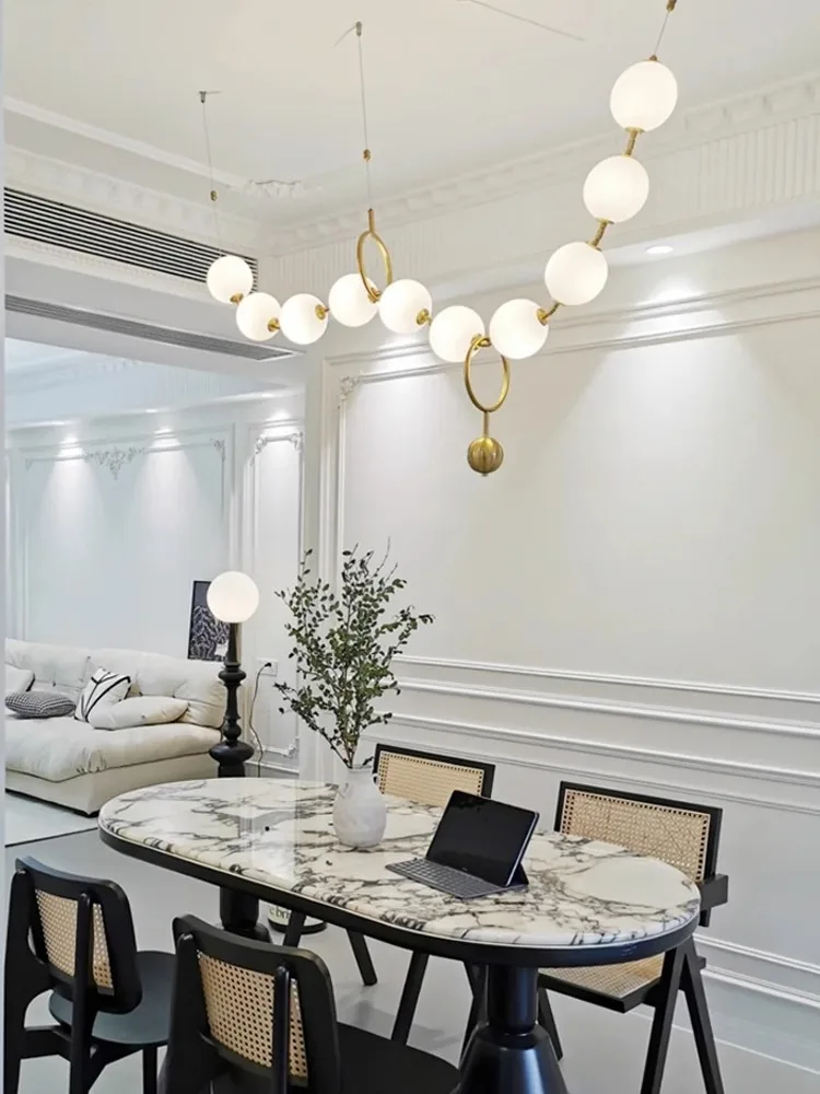Magic beans, restaurant, French, chandelier, modern, minimalist, pearl, necklace, bar, dining table