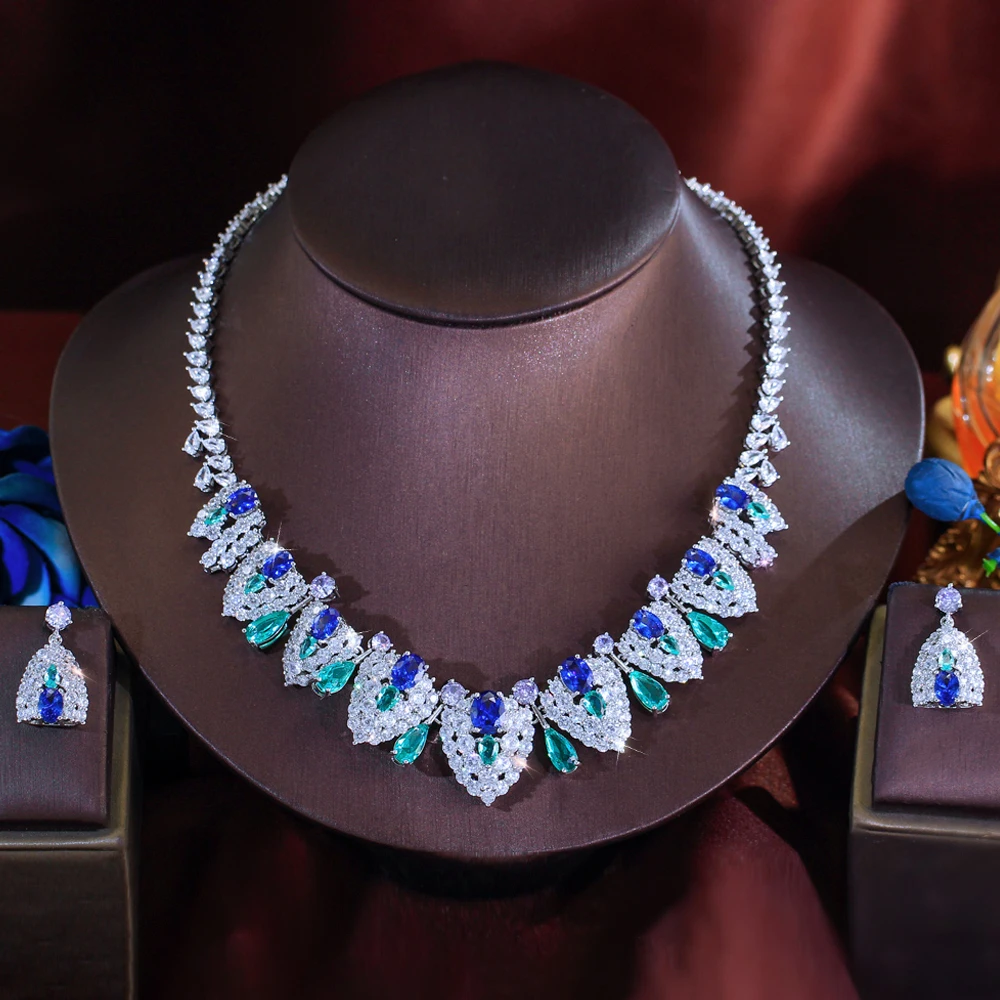 

ThreeGraces Luxury Brilliant Synthetic Tanzanite and Zirconia Shield Design Bridal Wedding Party Jewelry Set for Women T1080