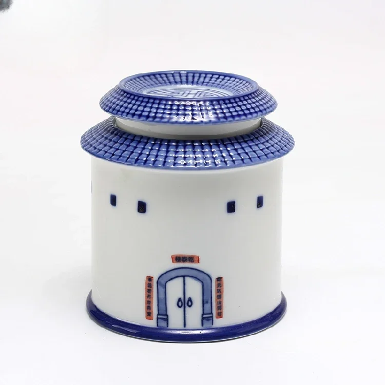 Hand-painted blue and white porcelain tulou wailongwu tea jar commemorative gift