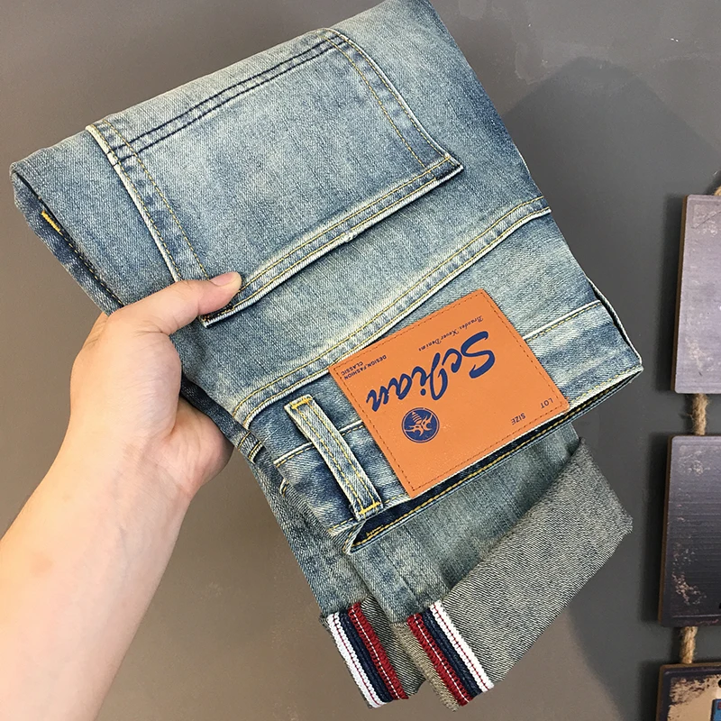 

High Quality Ripped Patchwork Jeans for Men - 2025 Trendy Brand Versatile American Retro Blue Straight Fit Stretch Denim Pants