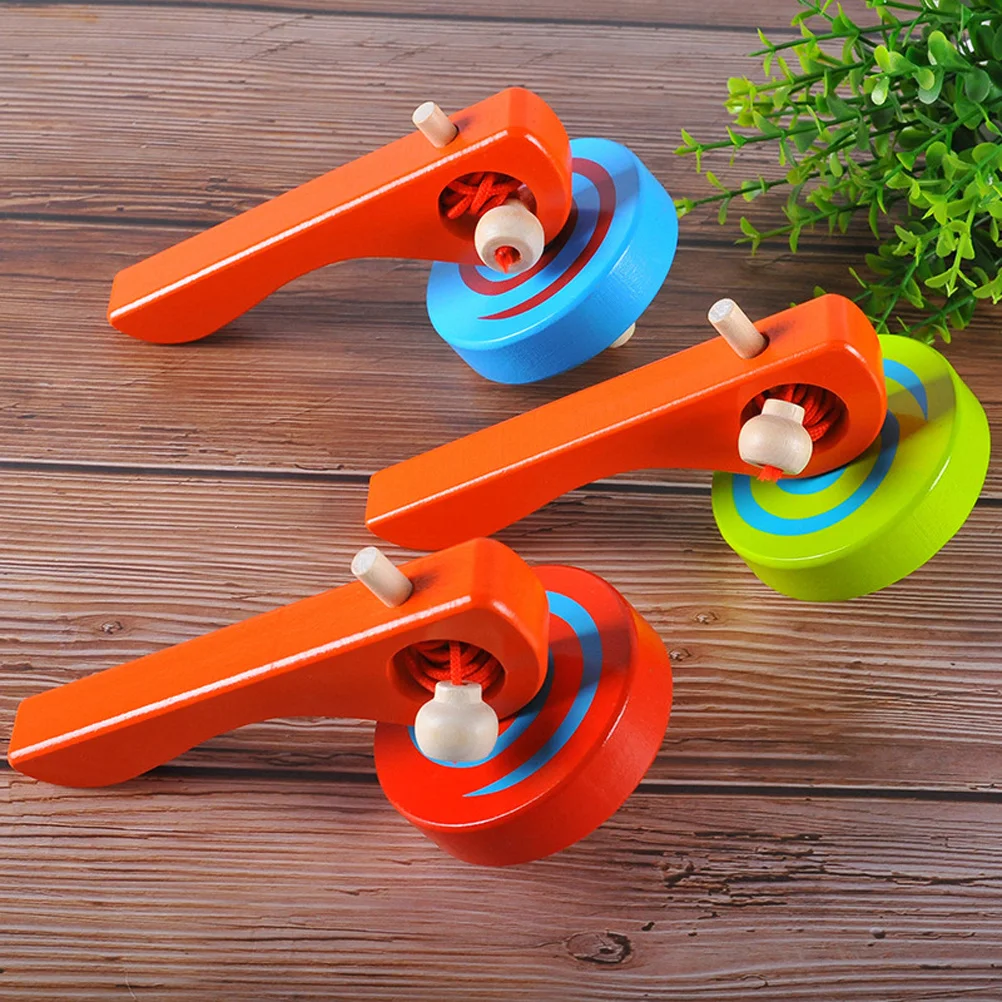 قمصان يدوية خشبية ملونة مع قاذفة لعبة دوارة صغيرة ممتازة للأطفال والكبار ممارسة التنسيق بين اليد والعين و