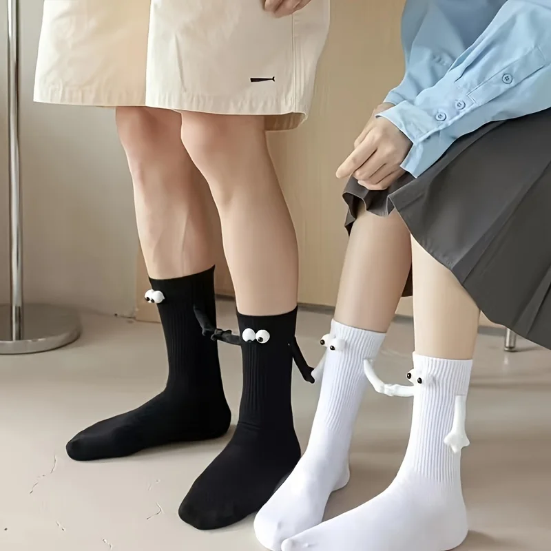 A pair of mid length socks, trendy for both men and women, magnetic attraction, super personality, 3D dolls, black and white ero