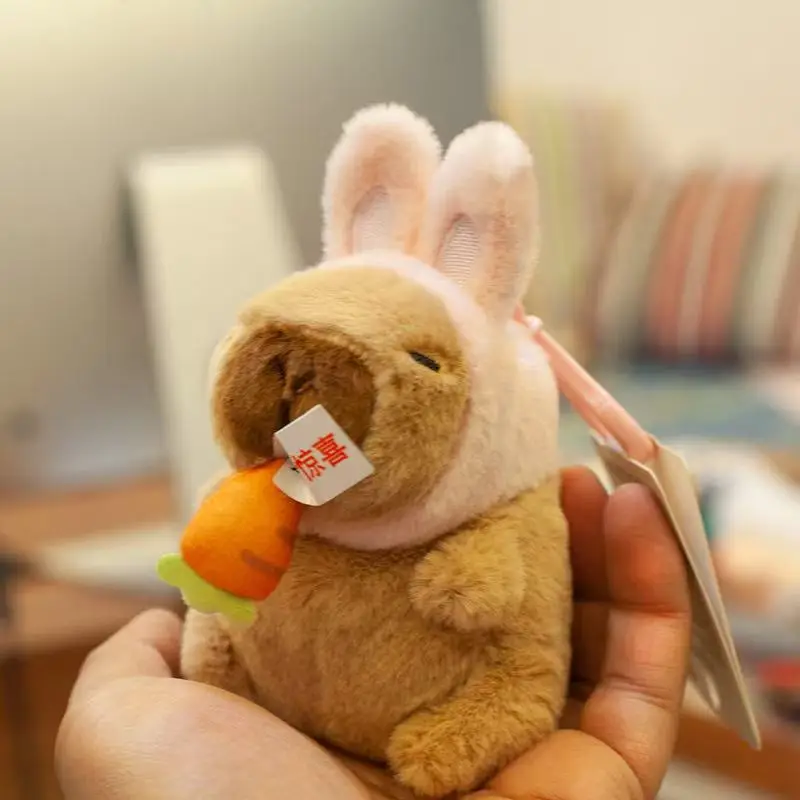 

The latest ear shaking Capibala doll backpack pendant is filled with plush toys, cartoon anime cute gifts, and interesting dolls