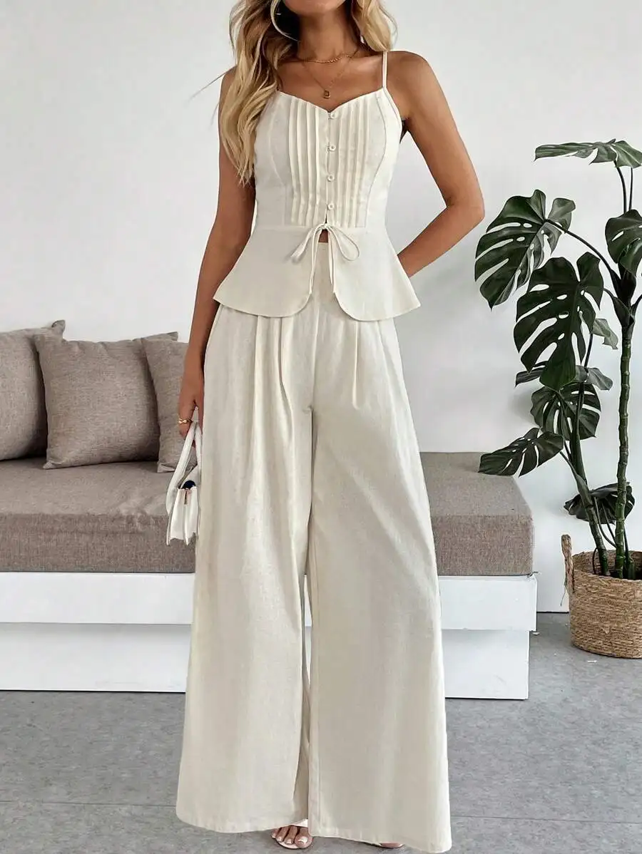 

White Linen Sleeveless Jumpsuit With Button Front And Palazzo Pants