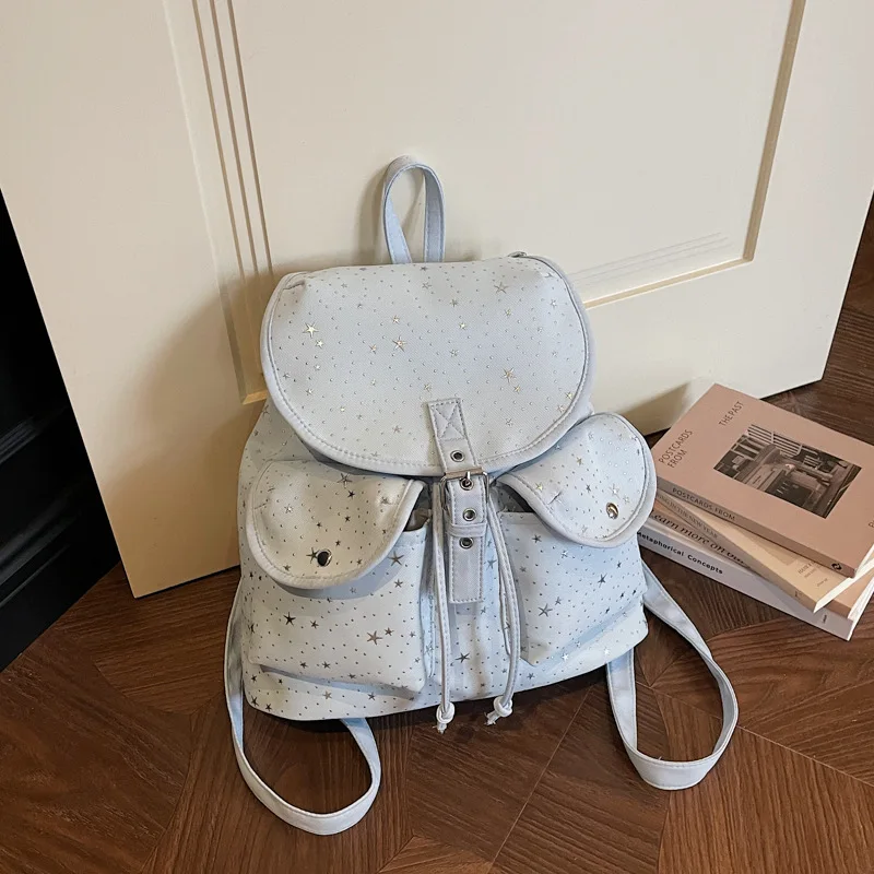 College-style star-patterned canvas backpack for women2026New trendy fashion commuter large-capacity casual student backpack