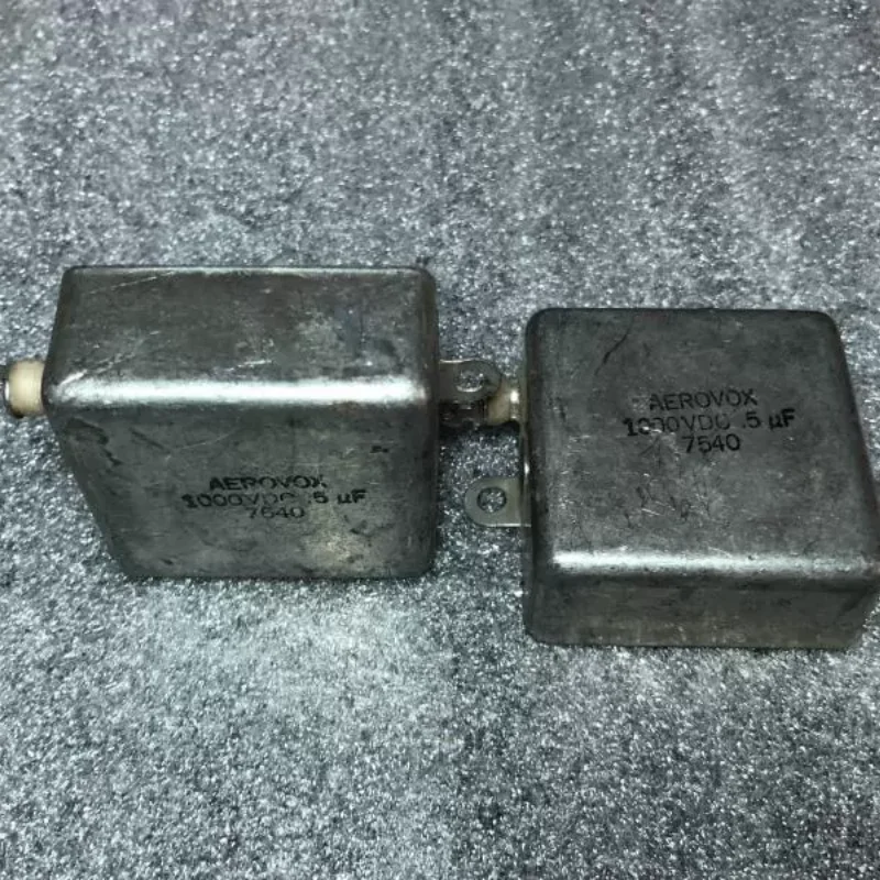 

Антикварный американский AEROVOX 0,5 мкФ заменяет 0,47 мкФ 1000 В медный корпус, соединительный масляный конденсатор с желчным пузырем