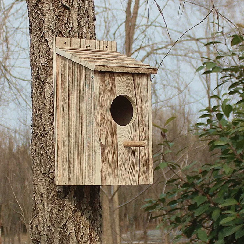 

Rustic Wooden Bird House, Outdoor Nesting Box with Weather-Resistant Roof, Natural Wood Construction