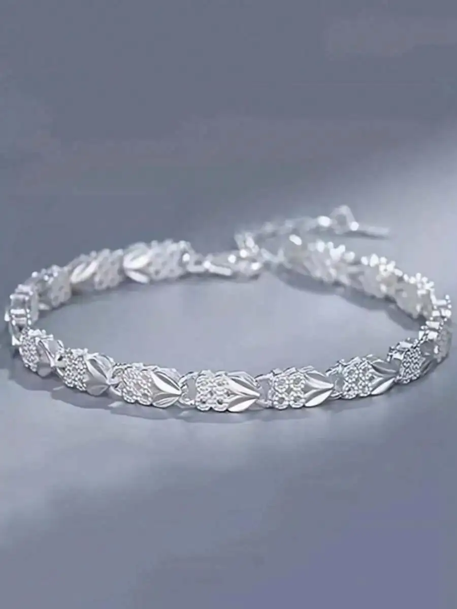 

Elegant Silver-Tone Floral Link Bracelet with Cubic Zirconia Accents