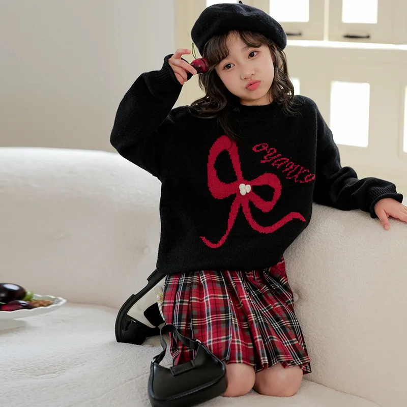 

2025 Autumn Winter Children Girl 2PCS Clothes Set Junior Girl Bowknot Knitted Tops+Plaid Pleated Skirt Christmas New Year Set