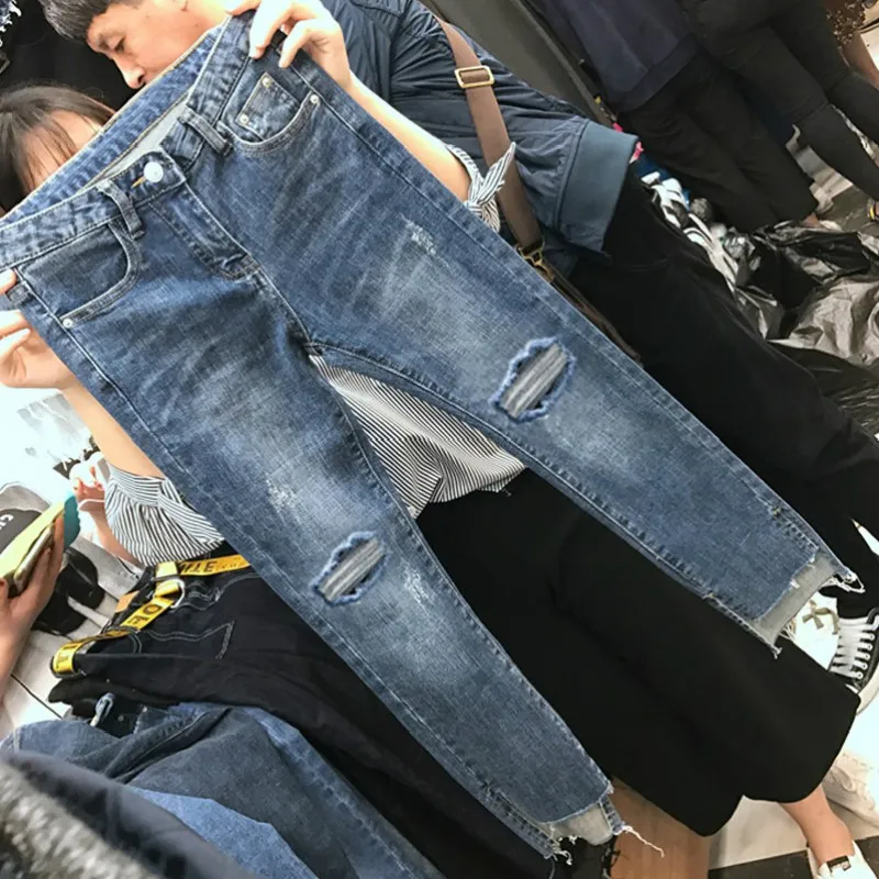 Obcisłe dżinsy z dziurami damskie wiosna lato jesień gorąca sprzedaży moda damska Casual Girls śliczne spodnie dżinsowe kobiece tanie hurtowo