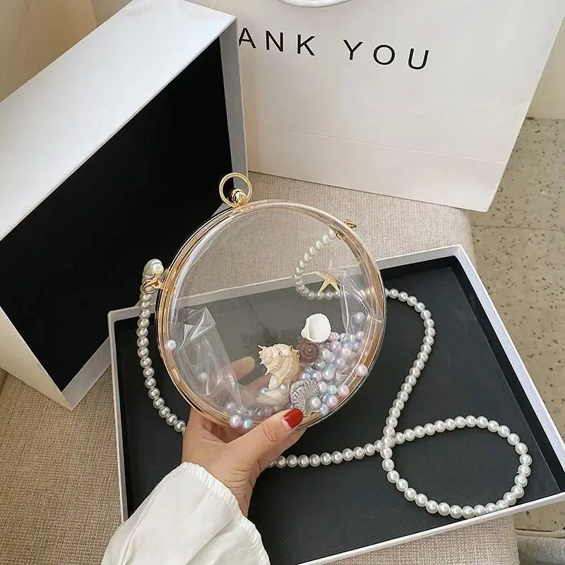 borse-da-donna-piccole-e-rotonde-in-pvc-trasparente-accessori-alla-moda-e-di-tendenza-per-le-signore