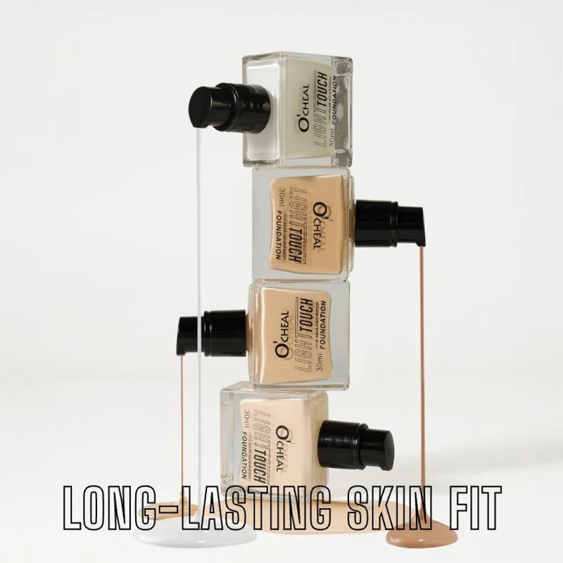 La base líquida duradera de alta cobertura de 4 colores resiste al sudor dura un aspecto transparente translúcido adecuado para todos los tonos de piel