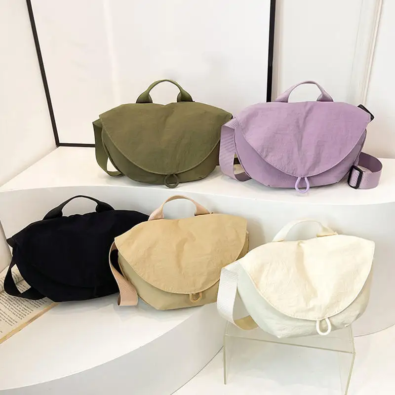 

Women Crossbody Fashion Hidden Magnetic Button Sports Riding Waist Bag Nylon Dumpling Shoulder Satchel Suitable for Travelling