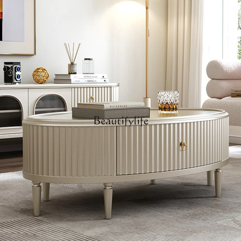 

02 American light luxury solid wood coffee table living room household oval champagne gold tea table