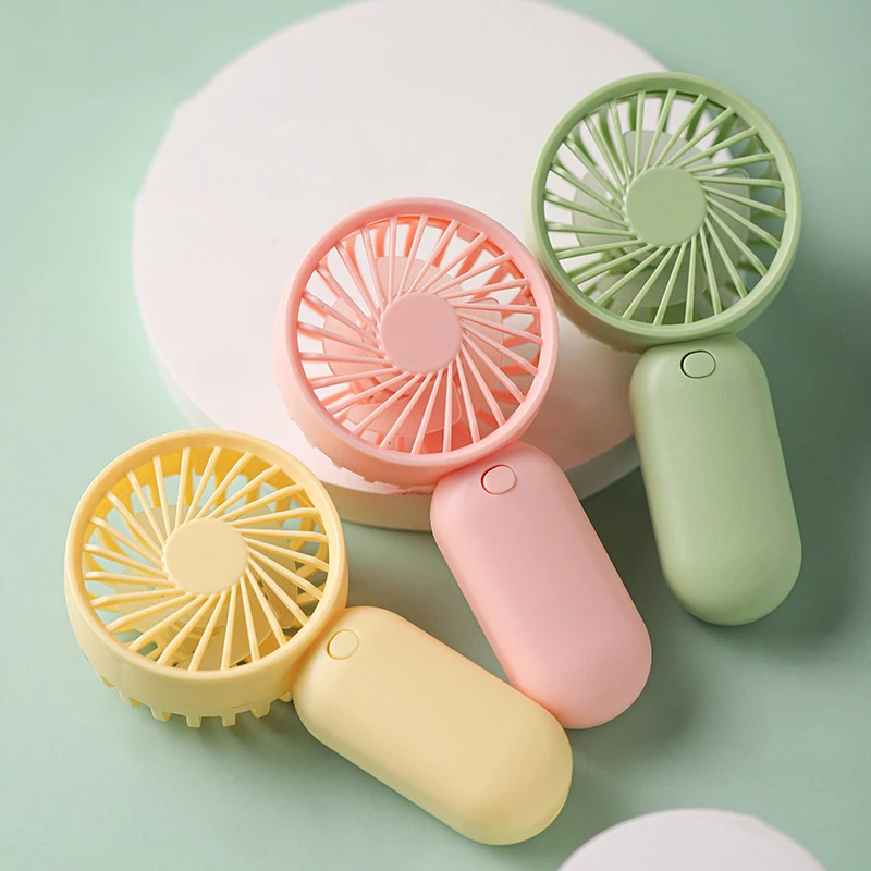 Colorful Portable Handheld Mini Fan AAA Battery Power Supply Mute Air Cooling Cooler For Summer Hot Trip Travel Home Office