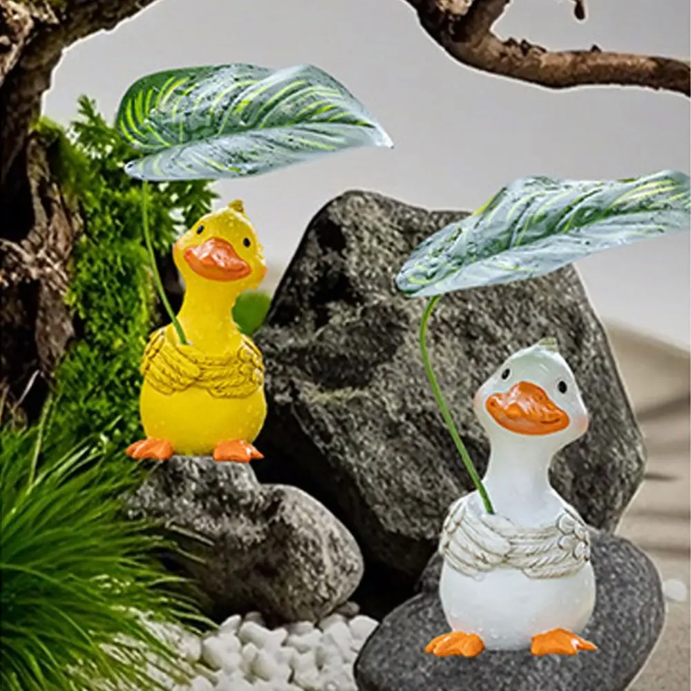 

Durable Cartoon Umbrella Holding Duck Statue Handmade Decorative Leaf Duck Figurine Resin Garden Animal Statue Balcony Patio