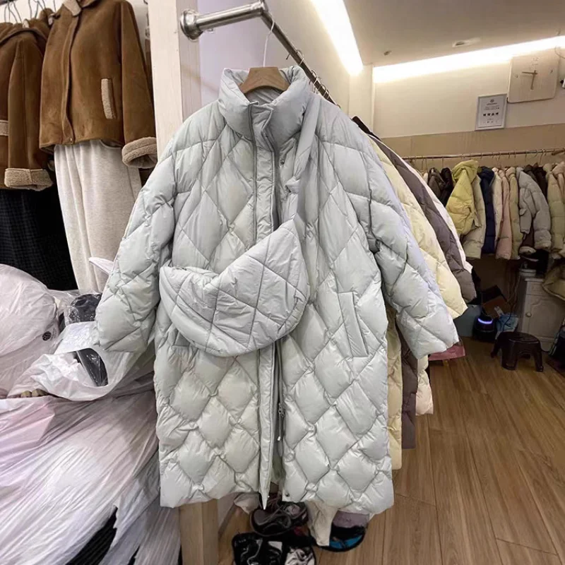 Doudoune longue pour femme, coupe ample avec sac, longueur aux genoux, épaisse et chaude, manteau à col montant, nouveau Style d'hiver 2025