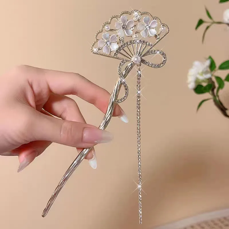 

Delicate metal camellia fan fringed hairpin female antique simple modern disc hair step hairpin cheongsam hairpin