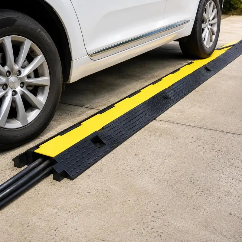 Protection de câble monocanal, en caoutchouc durable, supporte 2,5 tonnes, couvercle à accès facile, jaune haute visibilité, 100 cm, lot de 2