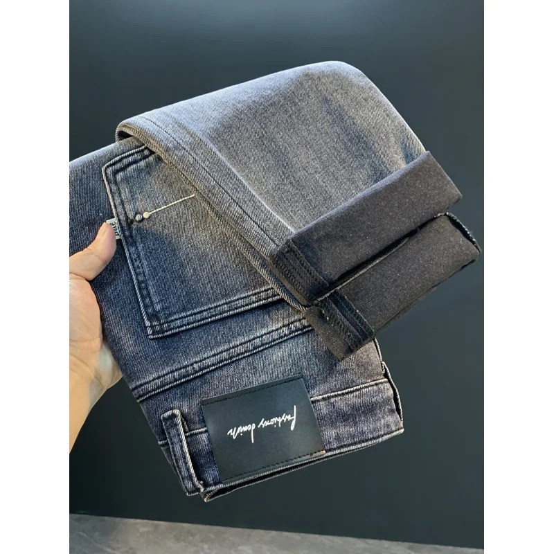 2025 خريف جديد الراقية الدخان الرمادي الجينز الرجال العلامة التجارية العصرية مرونة فضفاضة تظهر رقيقة مستقيم أنبوب السراويل الطويلة