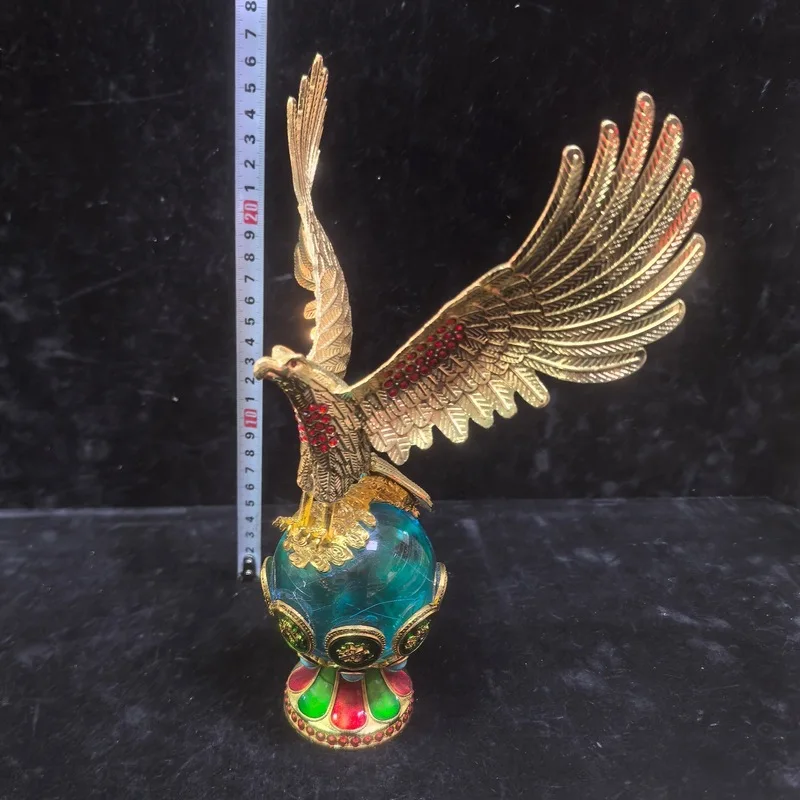 Antique Qing Dynasty gilded copper eagle ornament with cat's eye stone for office, living room, and home decoration