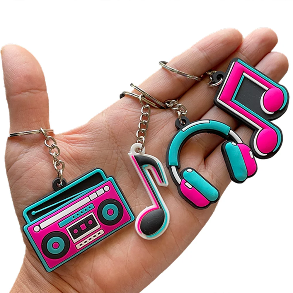 

12 Pieces Music Party Favors 80s Decorations Silicone Keychain Musical Note Roll Themed Party Supplies Radio Earphone Shaped