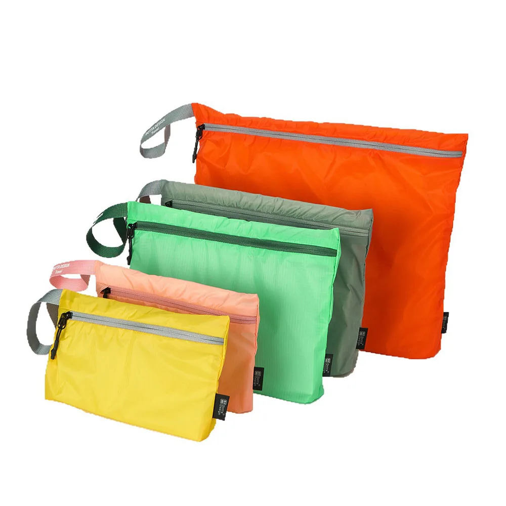 

1‌5D Waterproof Travel Organizer Pouch Portable Gear Bag For Toiletries Clothes Passport Coins Cards (Multi-Compartment Design)