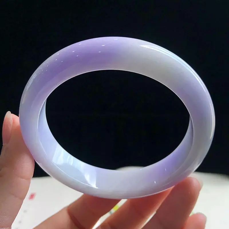 Violet bracelet, featuring a purple stone, a round design, and a texture resembling soft ice jade, in the style of a n