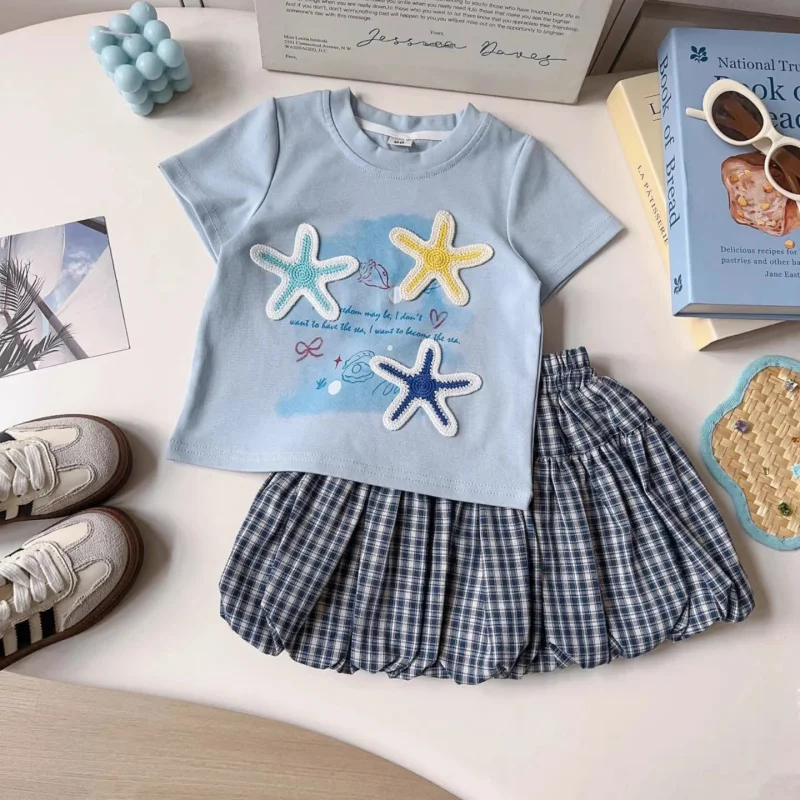 

Girls' new summer outfit2026Stylish baby girl two-piece set with starfish letter print short-sleeve top and tulip skirt