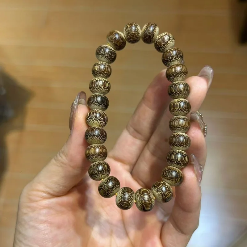 

Solid Jade and Brown Bracelet, Old Material Dragon Blood Golden Silk Bamboo with Full Fish-Eye Pattern