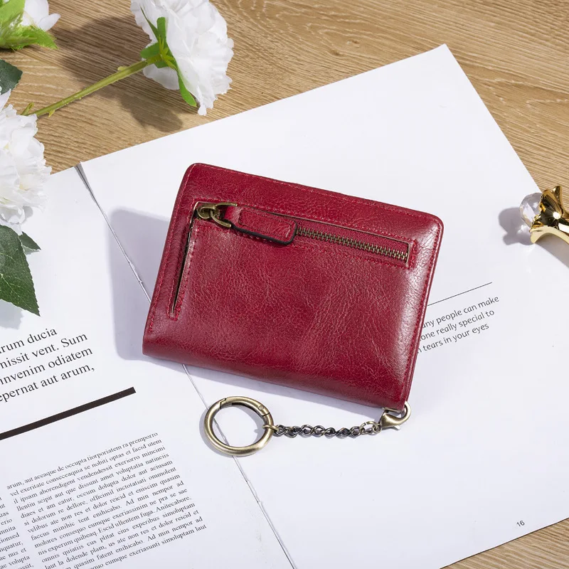 Damesportemonnees PU-leer Vrouwelijke portemonnee Hasp Korte tweevoudige portemonnee voor dames Mode Kaarthouder met ritssluiting Broekzak Sleutelhanger