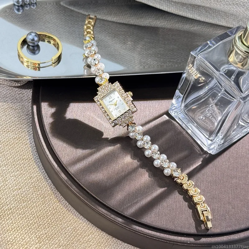 

Женские часы, двухрядные жемчужные изысканные бриллианты, овальные часы-браслет, винтажные легкие роскошные женские кварцевые часы 2025