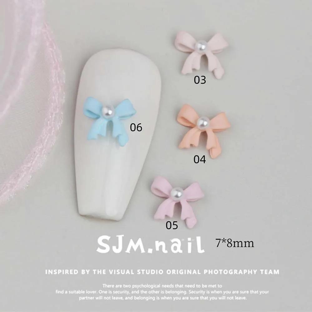 

10Pcs Pearl Ribbon Bow Nail Art Charms 3D Alloy 7*8mm Macarone Bowknot Tie Nail Art Rhinestones Cute DIY Manicure Decorations