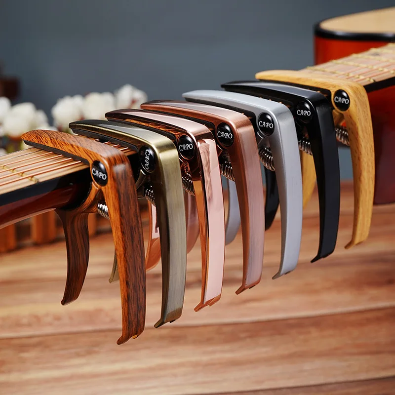 Capo de guitarra de Metal, abrazadera afinadora de guitarra, aleación de Zinc, gatillo de llave profesional, Capo para guitarra eléctrica acústica con agarre de goma