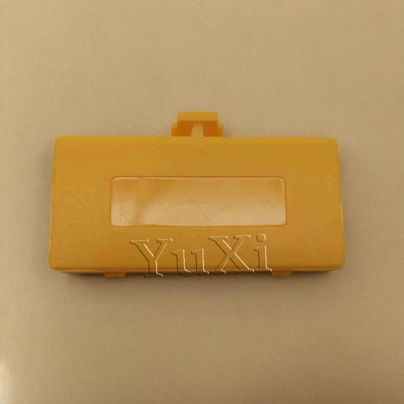 YuXi 10 สี 1PC สําหรับ GameBoy Pocket GBP คอนโซลแบตเตอรี่ประตูเปลี่ยนฝาปิดฝาหลังแบตเตอรี่ประตูอะไหล่ซ่อม