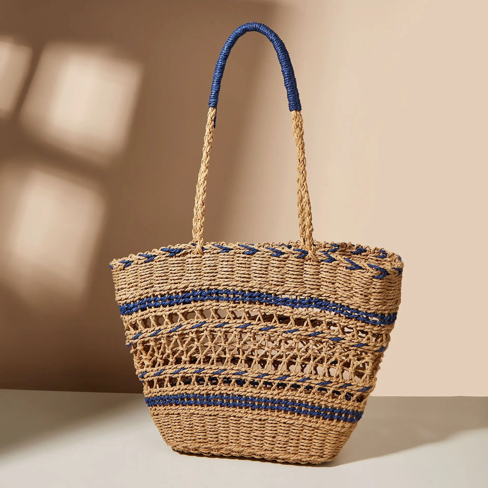 

New Hollowed Out Woven Fashionable Women's Bag with Contrasting Paper Rope and Grass Woven Bag Travel and Vacation Photo Bag